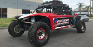 Full bore motor sports red and black recon prerunner front 3/4 view