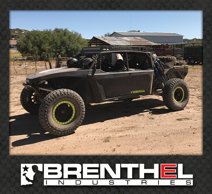 Brenthel recon prerunner side view on a dirt road