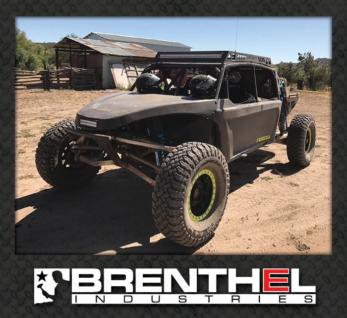 Brenthel recon prerunner front 3/4 view on a dirt road